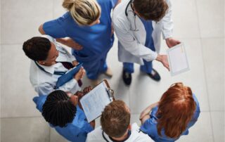 group of doctors looking at charts