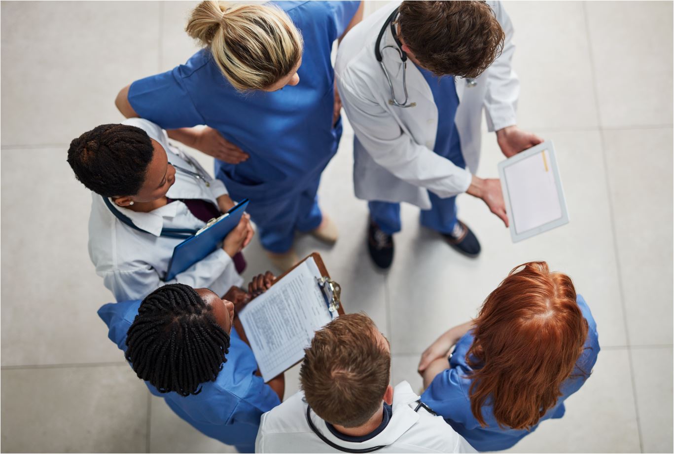 group of doctors looking at charts