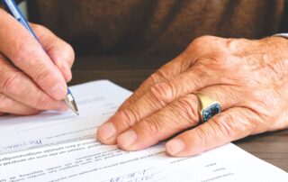 hand signing estate planning document